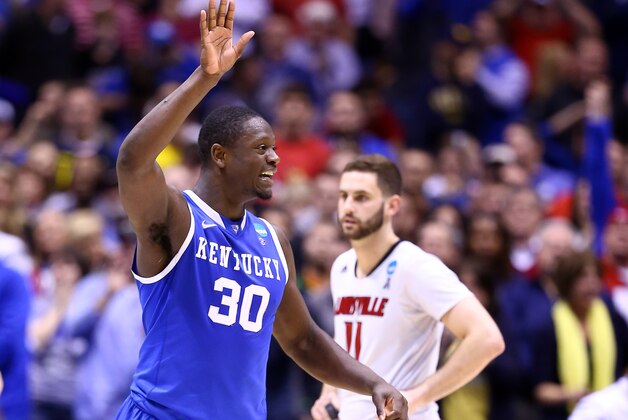 INDIANAPOLIS, IN - MARCH 28:  Julius Randle #30 of the Kentucky Wildcats celebrates defeating the Louisville Cardinals 74 to 69 during the regional semifinal of the 2014 NCAA Men's Basketball Tournament at Lucas Oil Stadium on March 28, 2014 in Indianapolis, Indiana.  (Photo by Andy Lyons/Getty Images)