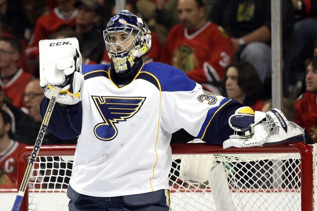 St. Louis Blues goalie Ryan Miller (39) looks to his teammates during the second period in Game 6 of a first-round NHL hockey playoff series against the Chicago Blackhawks in Chicago, Sunday, April 27, 2014. The Blackhawks won 5-1. (AP Photo/Nam Y. Huh)