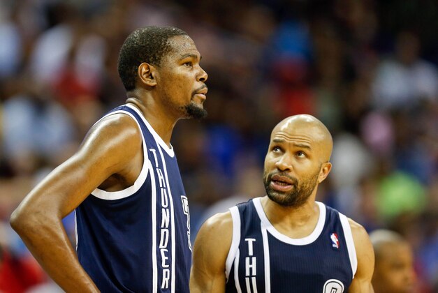 Apr 14, 2014; New Orleans, LA, USA; Oklahoma City Thunder forward Kevin Durant (35) and guard Derek Fisher (6) against the New Orleans Pelicans during the second half of a game at Smoothie King Center. The Pelicans defeated the Thunder 101-89. Mandatory Credit: Derick E. Hingle-USA TODAY Sports