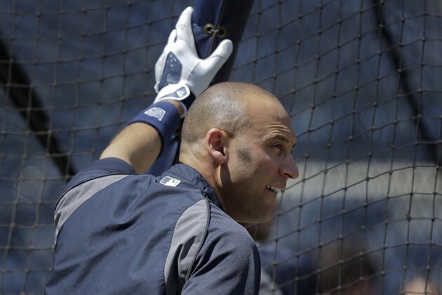 New York Yankees shortstop Derek Jeter (2) waits his turn in the batting cage before playing in a baseball game against the Pittsburgh Pirates, Saturday, May 17, 2014, in New York. (AP Photo/Julie Jacobson)