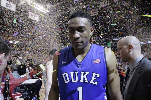 Duke's Jabari Parker (1) walks off the court after losing to Virginia in an NCAA college basketball game in the championship of the Atlantic Coast Conference tournament in Greensboro, N.C., Sunday, March 16, 2014. Virginia won 72-63. (AP Photo/Gerry Broome)