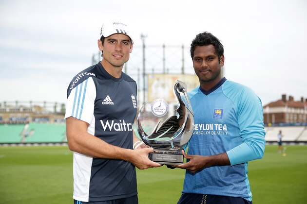 LONDON, ENGLAND - MAY 21:  Captains Alastair Cook of England and Angelo Mathews of Sri Lanka pose with the trophy during the England nets session at The Kia Oval on May 21, 2014 in London, England.  (Photo by Tom Shaw/Getty Images)