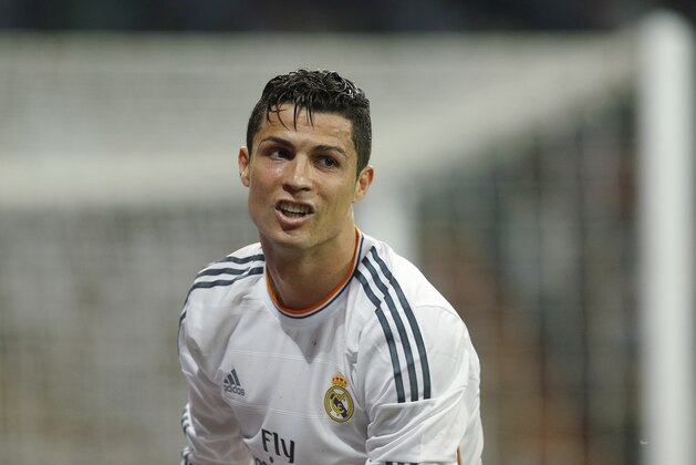Real Madrid's Cristiano Ronaldo from Portugal during a Spanish La Liga soccer match between Real Madrid and Valencia at the Santiago Bernabeu stadium  in Madrid, Spain, Sunday, May 4, 2014 . (AP Photo/Daniel Ochoa de Olza)