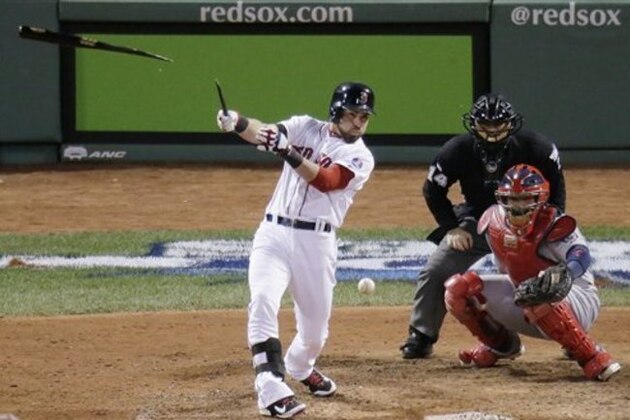 Boston Red Sox's Jacoby Ellsbury breaks his bat as he hits during the eighth inning of Game 2 of baseball's World Series against the St. Louis Cardinals Thursday, Oct. 24, 2013, in Boston. (AP Photo/Charlie Riedel)