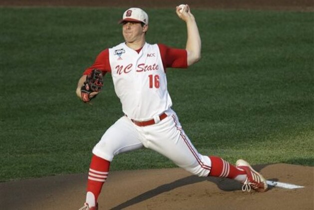 FILE - In this June 20, 2013, file photo, North Carolina State starting pitcher Carlos Rodon throws against North Carolina during an NCAA College World Series elimination baseball game in Omaha, Neb. (AP Photo/Nati Harnik, File)