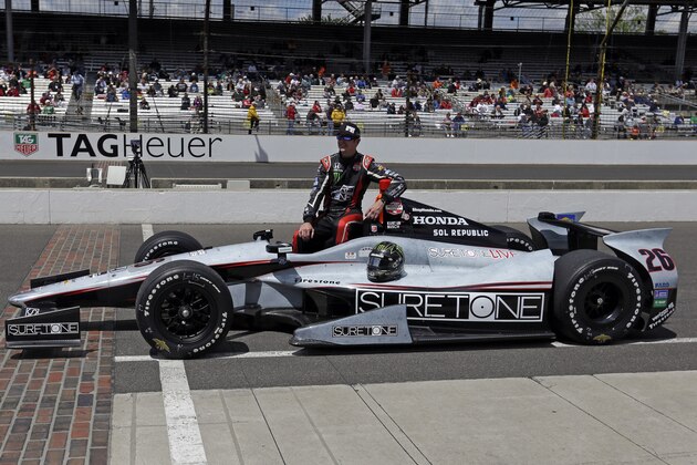 Driver Kurt Busch poses for his official qualification photo following his run on the first day of qualifications for Indianapolis 500 IndyCar auto race at the Indianapolis Motor Speedway in Indianapolis, Saturday, May 17, 2014. (AP Photo/Darron Cummings)
