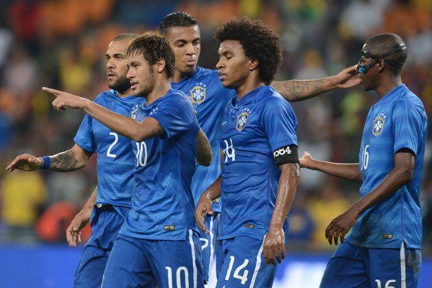 JOHANNESBURG, SOUTH AFRICA - MARCH 05: Neymar celebrates his goal with teammtes  during the International Friendly match between South Africa and Brazil at FNB Stadium on March 05, 2014 in Johannesburg, South Africa. (Photo by Lefty Shivambu/Gallo Images/Getty Images)