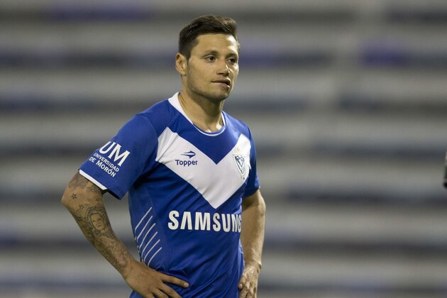 Argentina's Velez Sarsfield's Mauro Zarate reacts after missing a chance to score against Colombia's La Equidad during a Copa Sudamericana soccer match in Buenos Aires, Argentina, Wednesday, Oct. 2, 2013. (AP Photo/Eduardo Di Baia)