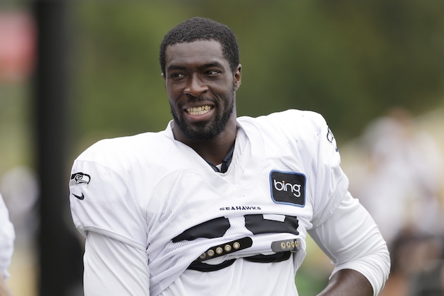 Seattle Seahawks' Benson Mayowa heads off the field following an NFL football training camp Wednesday, July 31, 2013, in Renton, Wash. (AP Photo/Elaine Thompson)