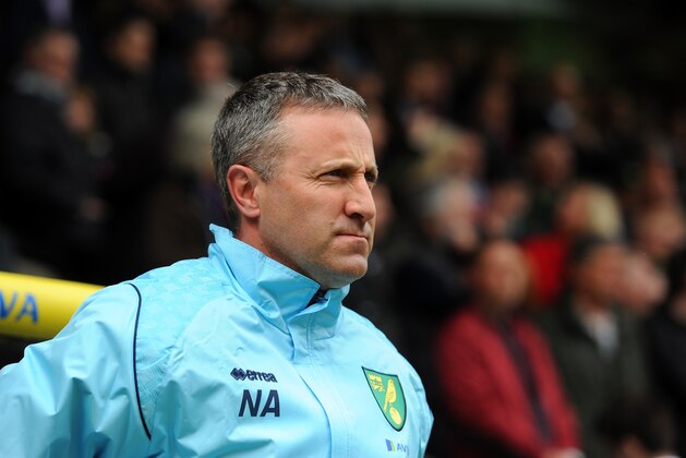 NORWICH, ENGLAND - MAY 11: Neil Adams, manager of Norwich City looks on during the Barclays Premier League match between Norwich City and Arsenal at Carrow Road on May 11, 2014 in Norwich, England.  (Photo by Steve Bardens/Getty Images)