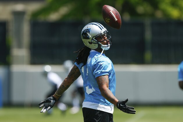 Carolina Panthers' Kelvin Benjamin tosses a football after making a catch at NFL football rookie minicamp in Charlotte, N.C., Saturday, May 17, 2014. (AP Photo/Chris Keane)