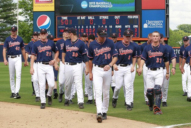 Jun 10, 2013; Charlottesville, VA, USA; Virginia Cavaliers players walk off the field after their game against the Mississippi State Bulldogs in the Charlottesville super regional of the 2013 NCAA baseball tournament at Davenport Field. The Bulldogs won 6-5 and advanced to the College World Series. Mandatory Credit: Geoff Burke-USA TODAY Sports