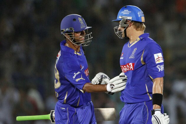 Rajasthan Royals Shane Watson, right, is complimented by Rahul Dravid after he hit a six during an Indian Premier League (IPL) cricket match between Rajasthan Royals and Royal Challengers Bangalore in Jaipur, India, Wednesday, May 11, 2011. (AP Photo/Gurinder Osan)