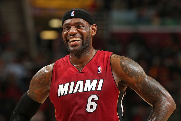CLEVELAND, OH - MARCH 18:  LeBron James #6 of the Miami Heat smiles during the game against the Cleveland Cavaliers at The Quicken Loans Arena on March 18, 2014 in Cleveland, Ohio. NOTE TO USER: User expressly acknowledges and agrees that, by downloading and/or using this Photograph, user is consenting to the terms and conditions of the Getty Images License Agreement. Mandatory Copyright Notice: Copyright 2014 NBAE (Photo by Joe Murphy/NBAE via Getty Images)
