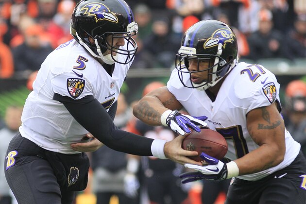 Baltimore Ravens quarterback Joe Flacco (5) hands off to running back Ray Rice (27) in the first half of an NFL football game against the Cincinnati Bengals, Sunday, Dec. 29, 2013, in Cincinnati. (AP Photo/Tom Uhlman)