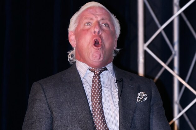 CONCORD, NC - JANUARY 20:  Former American Professional Wrestler Ric Flair performs his famous yell 'Wooooo!', for the media during the NASCAR Sprint Media Tour hosted by Charlotte Motor Speedway, held at the Embassy Suites, on January 20, 2010 in Concord, North Carolina.  (Photo by Jason Smith/Getty Images)