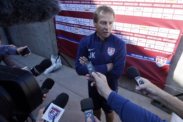 U.S. men's soccer coach Jurgen Klinsmann fields questions during the team's training camp in preparation for the World Cup, Wednesday, May 21, 2014, in Stanford, Calif. (AP Photo/Marcio Jose Sanchez)