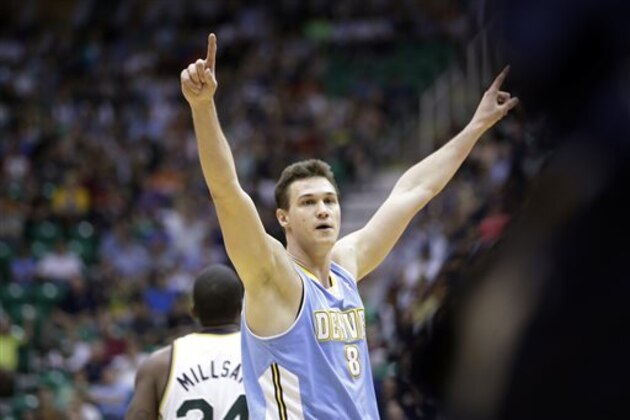 Denver Nuggets' Danilo Gallinari (8) celebrates in the fourth quarter during an NBA basketball game against the Utah Jazz, Wednesday, April 3, 2013, in Salt Lake City. The Nuggets defeated the Jazz 113-96. (AP Photo/Rick Bowmer)