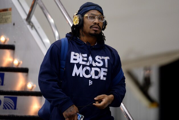 Jan 26, 2014; Newark, NJ, USA; Seattle Seahawks running back Marshawn Lynch arrives at Newark Liberty International Airport to face the Denver Broncos in Super Bowl XLVIII. Mandatory Credit: Joe Camporeale-USA TODAY Sports