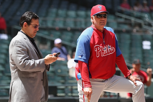 PHOENIX, AZ - APRIL 27:  General manager Ruben Amaro and manager Ryne Sandberg of the Philadelphia Phillies watch bating practice before the MLB game against the Arizona Diamondbacks at Chase Field on April 27, 2014 in Phoenix, Arizona.  (Photo by Christian Petersen/Getty Images)