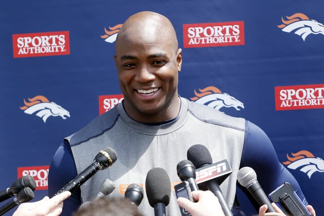 Denver Broncos defensive end DeMarcus Ware  talks to the media after working out at the NFL football teams training facility in Englewood, Colo., on Monday, April 21, 2014. (AP Photo/Ed Andrieski)