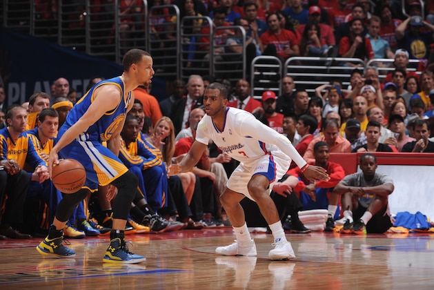 LOS ANGELES, CA - MAY 3: Chris Paul #3 of the Los Angeles Clippers defends against Stephen Curry #30 of the Golden State Warriors in Game Seven of the Western Conference Quarterfinals during the 2014 NBA Playoffs at Staples Center on May 3, 2014 in Los Angeles, California. NOTE TO USER: User expressly acknowledges and agrees that, by downloading and/or using this Photograph, user is consenting to the terms and conditions of the Getty Images License Agreement. Mandatory Copyright Notice: Copyright 2014 NBAE (Photo by Andrew D. Bernstein/NBAE via Getty Images)