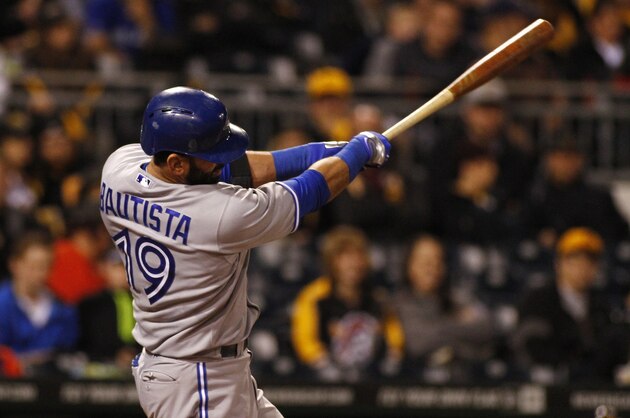 PITTSBURGH, PA - MAY 03:  Jose Bautista #19 of the Toronto Blue Jays hits a solo home run in the sixth inning against the Pittsburgh Pirates during the game at PNC Park May 3, 2014 in Pittsburgh, Pennsylvania.  (Photo by Justin K. Aller/Getty Images)