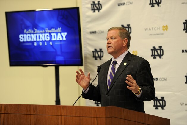 Notre Dame football coach Brian Kelly talks about recruits during signing day at Notre Dame Feb. 5, 2014 in South Bend, Ind.  (AP Photo/Joe Raymond)