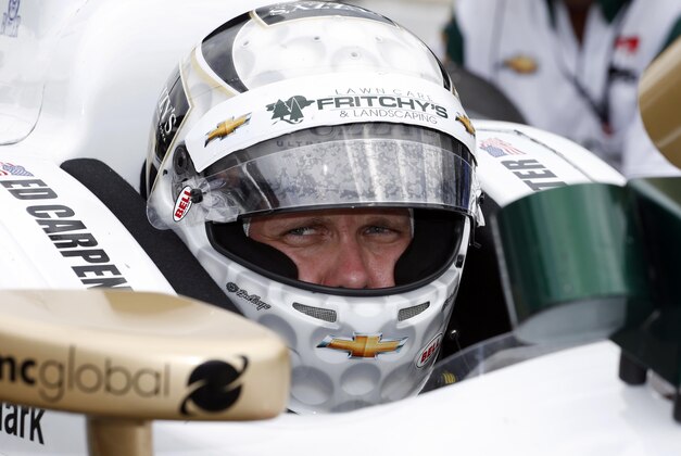 May 12, 2014; Indianapolis, IN, USA; IndyCar Series driver Ed Carpenter sits in his car during practice for the 2014 Indianapolis 500 at Indianapolis Motor Speedway. Mandatory Credit: Brian Spurlock-USA TODAY Sports