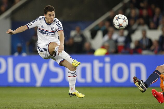 Chelsea's Eden Hazard takes a shot during the Champions League quarterfinal first leg soccer match between PSG and Chelsea, at the Parc des Princes stadium, in Paris, Wednesday, April 2, 2014. (AP Photo/Christophe Ena)