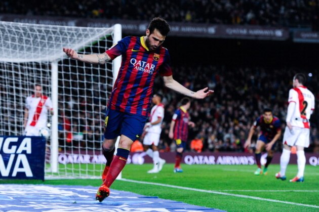 BARCELONA, SPAIN - FEBRUARY 15:  Cesc Fabregas of FC Barcelona celebrates after his teammate Pedro Rodriguez scored his team's fourth goal during the La Liga match between FC Barcelona and Rayo Vallecano de Madrid at Camp Nou on February 15, 2014 in Barcelona, Spain.  (Photo by David Ramos/Getty Images)