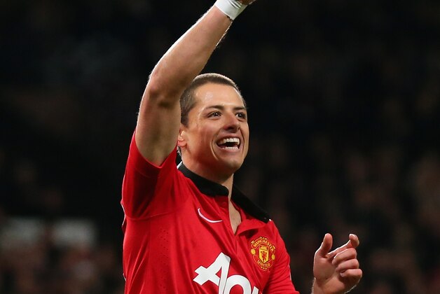 MANCHESTER, ENGLAND - JANUARY 05:  Javier Hernandez of Manchester United celebrates scoring his team's first goal during the FA Cup with Budweiser Third round match between Manchester United and Swansea City at Old Trafford on January 5, 2014 in Manchester, England.  (Photo by Alex Livesey/Getty Images)