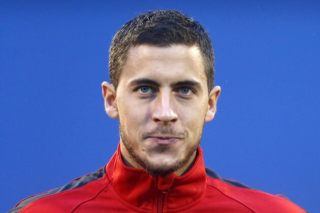 Belgium's Eden Hazard listens to the national anthems ahead of their their group A World Cup qualifying soccer match in Zagreb, Friday, Oct. 11, 2013. (AP Photo/Darko Bandic)