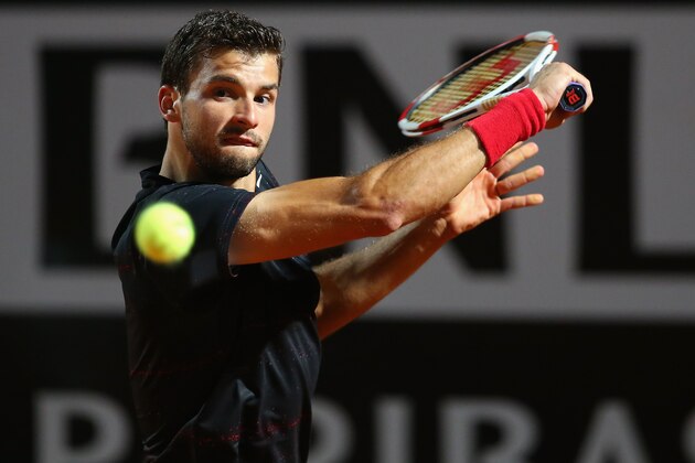 ROME, ITALY - MAY 17:  Grigor Dimitrov of Bulgaria in action against Rafael Nadal of Spain during day seven of the Internazionali BNL d'Italia tennis 2014 on May 17, 2014 in Rome, Italy.  (Photo by Julian Finney/Getty Images)