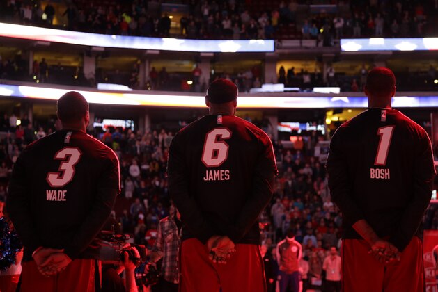 Miami Heat's Dwyane Wade, from left, LeBron James and Chris Bosh line up before an NBA basketball game against the Philadelphia 76ers, Friday, Jan. 17, 2014, in Philadelphia. (AP Photo/Matt Slocum)