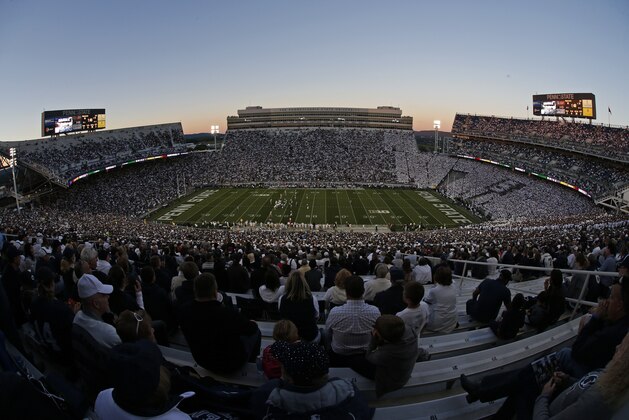 Fans watch the second quarter of an NCAA college football game between Penn St and Central Florda at Beaver Stadium in State College, Pa., Saturday, Sept. 14, 2013. UCF won 34-31. (AP Photo/Gene J. Puskar)