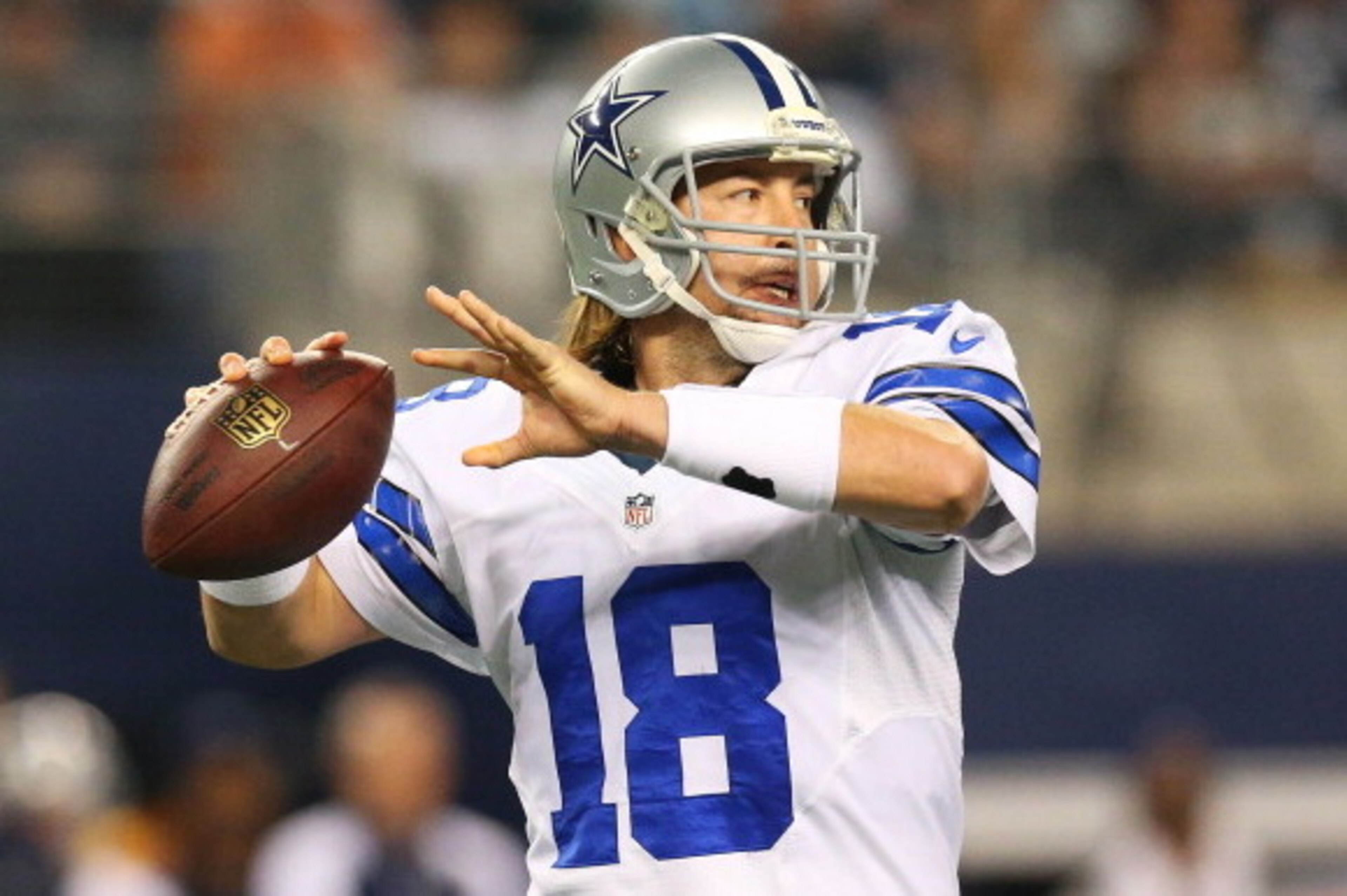 ARLINGTON, TX - DECEMBER 29:  Kyle Orton #18 of the Dallas Cowboys looks to pass in the first half against the Philadelphia Eagles at Cowboys Stadium on December 29, 2013 in Arlington, Texas.  (Photo by Ronald Martinez/Getty Images)