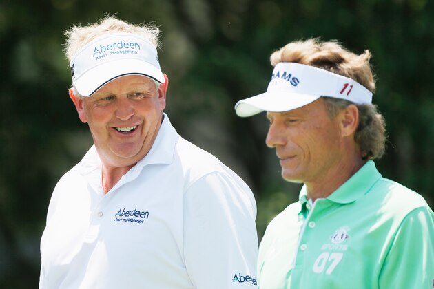 OMAHA, NE - JULY 12:  Colin Montgomerie of Scotland (L) walks alongside Bernhard Langer of Germany on the first hole during the second round of the 2013 U.S. Senior Open Championship at Omaha Country Club on July 12, 2013 in Omaha, Nebraska.  (Photo by Scott Halleran/Getty Images)