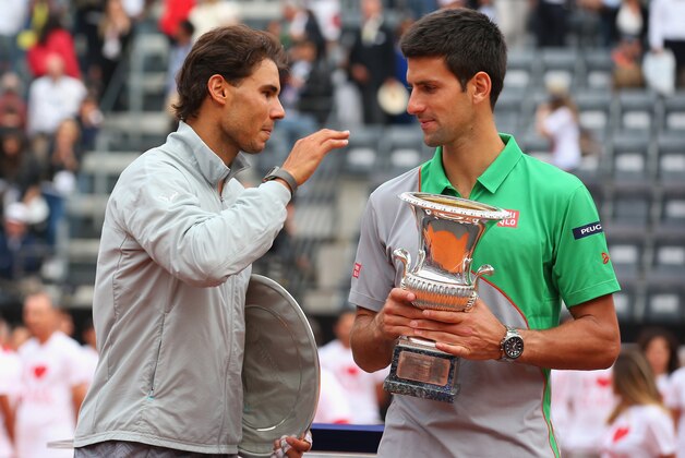ROME, ITALY - MAY 18:  Novak Djokovic of Serbia with the winners trophy next to runner up Rafael Nadal of Spain after the final during day eight of the Internazionali BNL d'Italia tennis 2014 on May 18, 2014 in Rome, Italy.  (Photo by Julian Finney/Getty Images)