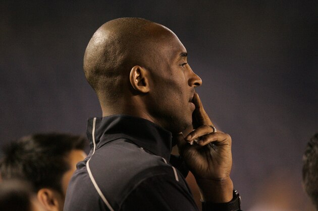 SAN DIEGO, CA - APRIL 10:  NBA Los Angeles Laker Kobe Bryant stands on the sideline prior to the start of the game against the United States and China during an international firendly match at Qualcomm Stadium on April 10, 2014 in San Diego, California. (Photo by Kent C. Horner/Getty Images)