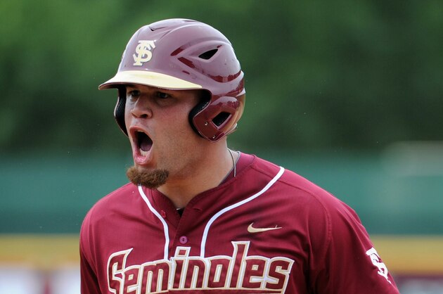 Jun 8, 2013; Tallahassee, FL, USA; Florida State Seminoles left fielder Dj Stewart (8) reacts after a hit against the Indiana Hoosiers during the Tallahassee super regional of the 2013 NCAA baseball tournament at Dick Howser Stadium. Mandatory Credit: Melina Vastola-USA TODAY Sports
