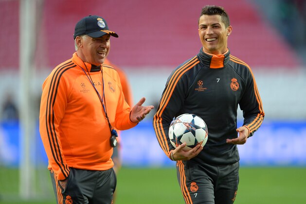 LISBON, PORTUGAL - MAY 23:  Head Coach, Carlo Ancelotti of Real Madrid shares a joke with Cristiano Ronaldo of Real Madrid during a Real Madrid training session ahead of the UEFA Champions League Final against Club Atletico de Madrid at Estadio da Luz on May 23, 2014 in Lisbon, Portugal.  (Photo by Michael Regan/Getty Images)