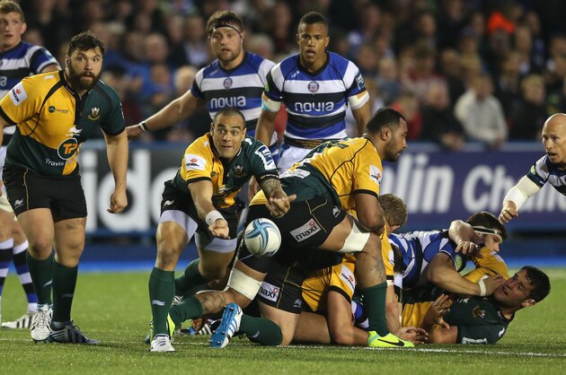 CARDIFF, WALES - MAY 23: Kahn Fotuali'i of Northampton passes the ball during the Amlin Challenge Cup Final between Bath and Northampton Saints at Cardiff Arms Park on May 23, 2014 in Cardiff, Wales.  (Photo by David Rogers/Getty Images)