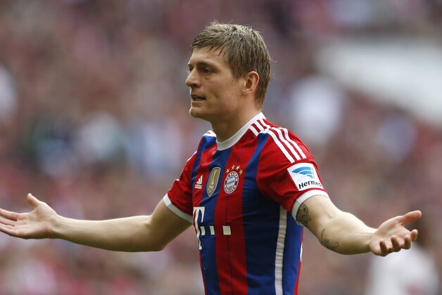 Bayern's Toni Kroos gestures during the German first division Bundesliga soccer match between FC Bayern Munich and VfB Stuttgart, in Munich, southern Germany, Saturday, May 10, 2014. (AP Photo/Matthias Schrader)