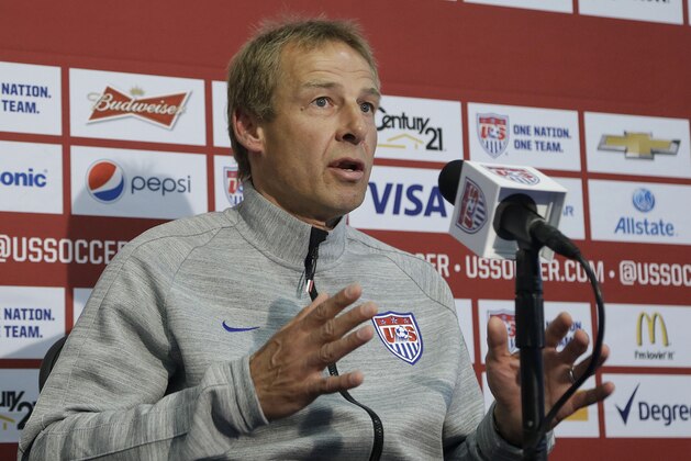 United States soccer coach Jurgen Klinsmann speaks at a news conference for the World Cup soccer tournament in Stanford, Calif., Friday, May 23, 2014. (AP Photo/Jeff Chiu)