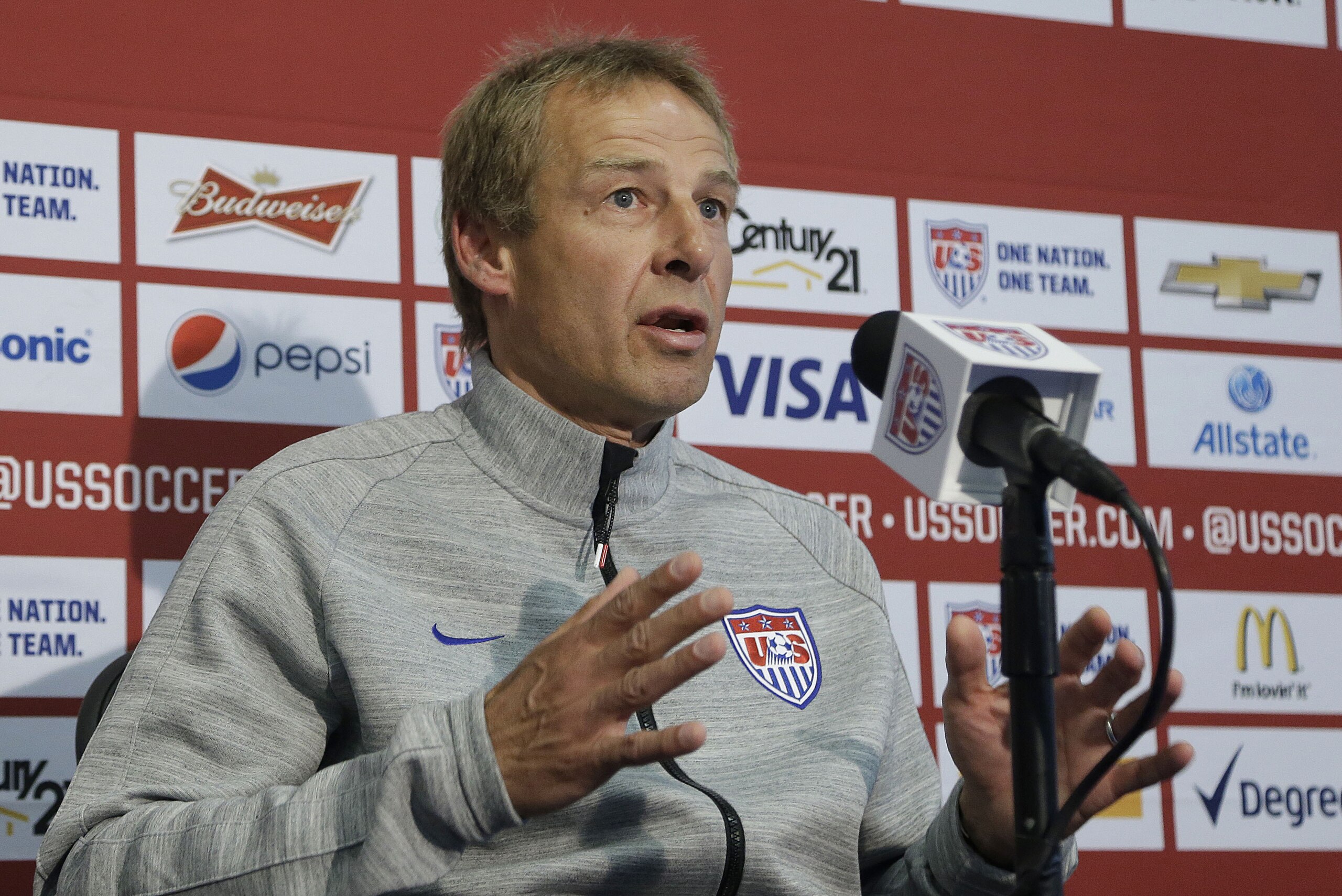 United States soccer coach Jurgen Klinsmann speaks at a news conference for the World Cup soccer tournament in Stanford, Calif., Friday, May 23, 2014. (AP Photo/Jeff Chiu)