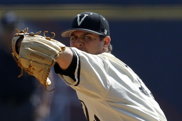 Vanderbilt's Tyler Beede (11) pitches against Mississippi during the1st inning at the Southeastern Conference NCAA college baseball tournament on Thursday, May 22, 2014, in Hoover, Ala. (AP Photo/Butch Dill)