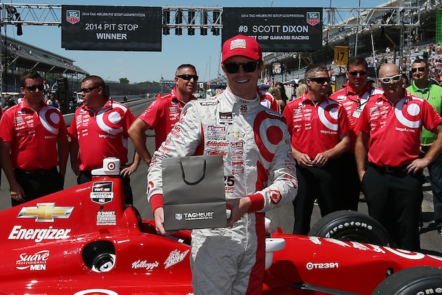 INDIANAPOLIS, IN - MAY 23:  Scott Dixon of New Zealand, driver of the #9 Target Chip Ganassi Racing Chevrolet Dallara, celebrates after winning the pit stop challenge on Carb Day for the 98th running of the Indianapolis 500 Mile Race on May 23, 2014 at Indianapolis Motor Speedway in Indianapolis, Indiana.  (Photo by Chris Graythen/Getty Images)