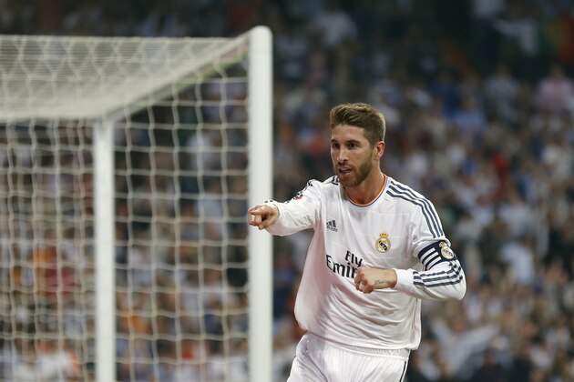 Real Madrid's Sergio Ramos celebrates his goal during a Spanish La Liga soccer match between Real Madrid and Valencia at the Santiago Bernabeu stadium in Madrid, Spain, Sunday, May 4, 2014 . (AP Photo/Daniel Ochoa de Olza)