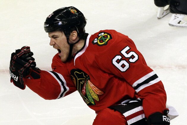 Chicago Blackhawks' Andrew Shaw celebrates after scoring a goal against the St. Louis Blues during the third period in Game 6 of a first-round NHL hockey playoff series in Chicago, Sunday, April 27, 2014. The Blackhawks won 5-1. (AP Photo/Nam Y. Huh)